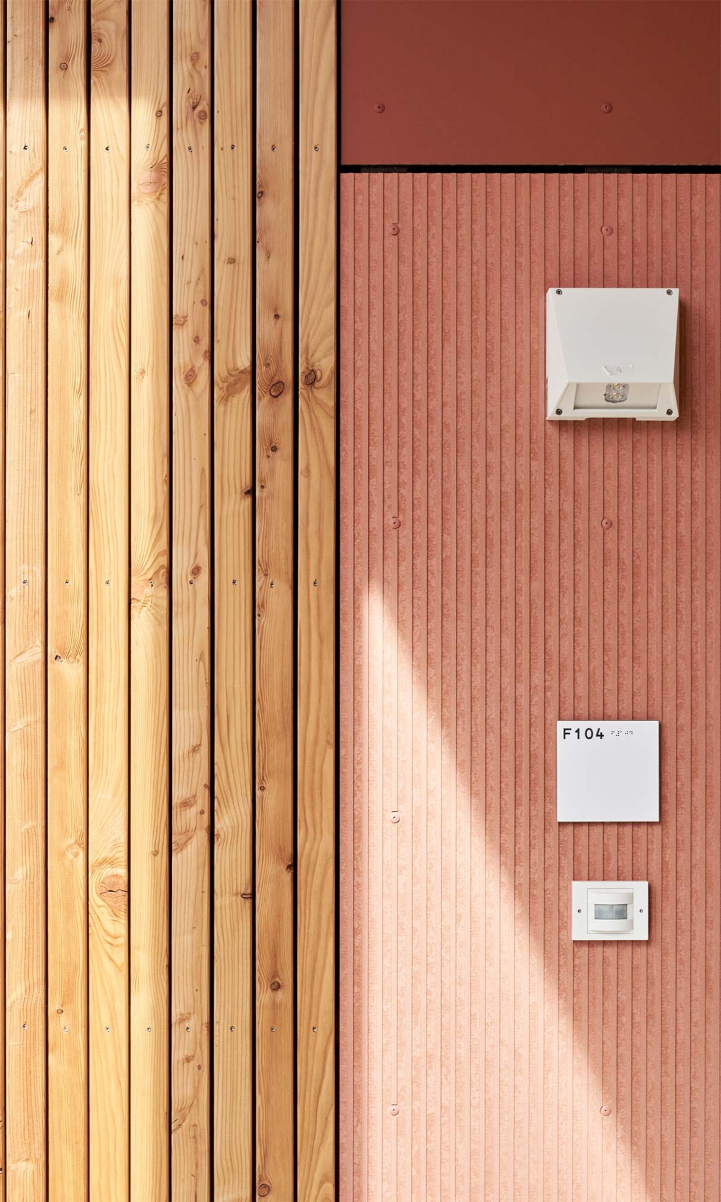 Entrance doors and timber facade